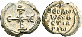 Theodoros, protovestiarios, 8th century. Seal (Lead, 27 mm, 13.30 g, 12 h). Large cruciform monogram of XPICTE BOHΘEI ("Christ, help"). Rev. ΘЄOΔⲰ/PⲰ ...