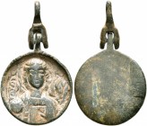 Uncertain, circa 10th-13th centuries. Amulet (Bronze, 17 mm, 2.71 g). Facing, nimbate bust of St. Michael, holding a globe in his right hand. Rev. Bla...