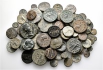 A lot containing 94 bronze coins. Includes: Greek and Roman Provincial. Fair to fine. LOT SOLD AS IS, NO RETURNS. 94 coins in lot.