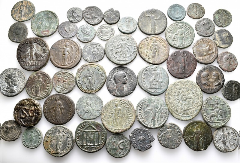 A lot containing 49 bronze coins. All: Roman Provincial. About fine to very fine...