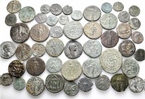 A lot containing 49 bronze coins. All: Roman Provincial. About fine to very fine. LOT SOLD AS IS, NO RETURNS. 49 coins in lot.