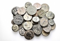 A lot containing 48 bronze coins. All: Roman Provincial. Fine to very fine. LOT SOLD AS IS, NO RETURNS. 48 coins in lot.