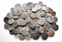 A lot containing 123 bronze coins. All: Islamic. Fine to about very fine. LOT SOLD AS IS, NO RETURNS. 123 coins in lot.