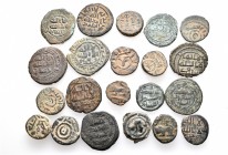 A lot containing 21 bronze coins. All: Islamic. LOT SOLD AS IS, NO RETURNS. 21 coins in lot.
