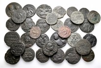 A lot containing 33 bronze coins. All: Islamic. About very fine to good very fine. LOT SOLD AS IS, NO RETURNS. 33 coins in lot.