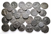 A lot containing 33 bronze coins. All: Islamic. About very fine to good very fine. LOT SOLD AS IS, NO RETURNS. 33 coins in lot.