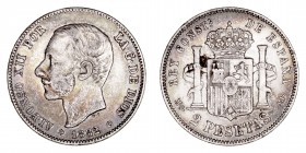 La Peseta
Alfonso XII
2 Pesetas. AR. 1882/1 *18-82 MSM. 9.95g. Cal.30. Tonalidad y mancha en reverso. (MBC).
