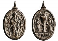 Medallas
Religiosas
Medalla. AE. (siglo XVIII). Inmaculada y Cáliz flanqueado de ángeles, en exergo ROMA. 25.00mm. Ovalada con anilla. MBC.