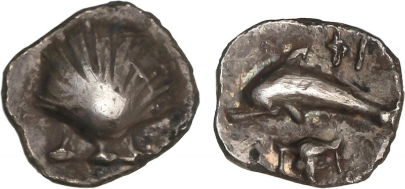 GREEK COINS
Litra. 325-280 a.C. TARENTUM. CALABRIA. Anv.: Concha. Rev.: Delfín ...