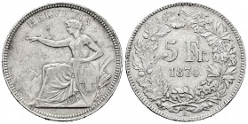 Switzerland. 5 francs. 1874. Brussels. B con punto. (Km-11). Ag. 24,89 g. Minor nicks on edge. Scarce. Choice VF. Est...150,00.   

SPANISH DESCRIPTIO...