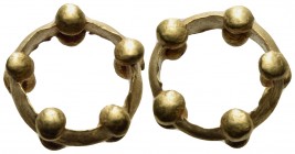 CELTIC, Uncertain. Circa 1200-500 BC. Ring money (Gold, 15 mm, 3.19 g). Rev. A small ring with five pairs of double beads. Very fine.
From the Trausn...