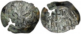 Michael VIII Palaeologus, 1261-1282. Trachy (Bronze, 28 mm, 1.43 g, 6 h), Thessalonica. Large fleur-de-lis. Rev. X/M/Δ/E/C/Π/T - O/ΠΑ/ΟΛ/Γ/Ο/S Michael...