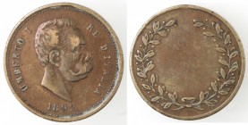 Medaglie. Umberto I. 1878-1900. Medaglia premio. Ae. Diametro mm. 25. BB+. Colpetti. (D. 0821)