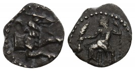 Greek
 Cilicia - AR 3/4 Obol (uncertain mint or satrap, Tarsus (?), c. 4th century BC, 0.5gr 10.7
 Baal enthroned to left holding long dotted sceptre ...