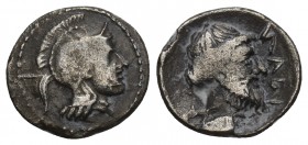 Cgreek
ILICIA, Nagidos. Circa 400-380 BC. AR Obol 0.6gr 11mm
 Head of Athena right / Bearded head of Dionysos right.