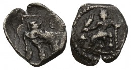 Greek
 Cilicia - AR 3/4 Obol (uncertain mint or satrap, Tarsus (?), c. 4th century BC, 0.5gr 11.3mm
 Baal enthroned to left holding long dotted sceptr...