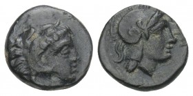 Greek 
Mysia, Pergamon Æ9. Circa 310-282 BC. 0.8gr 9.4mm
Head of Herakles right, wearing lion skin headdress / Helmeted head of Athena right; ΠEP down...