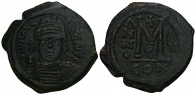 Byzantine
Maurice Tiberius Ӕ Nummus. Constantinople, Dated RY 6 11.9gr 31mm
 Helmeted and cuirassed bust facing, holding globus cruciger and shield / ...