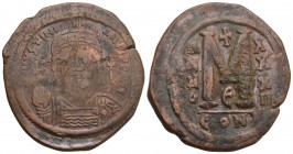 Byzantine
JUSTINIAN I. 527-565 AD. Æ Follis. Constantinople mint. Dated Year 32 (558/9 AD). 17gr 33.3mm
Helmeted, diademed, and cuirassed bust facing,...