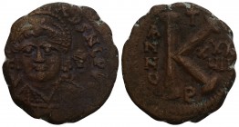 Byzantine Justinian I Æ 20 Nummi. Theoupolis (Antioch), dated RY 37 8.9gr 25.6mm
 [D N IVSTINIANVS P P AVG], helmeted and cuirassed bust facing, holdi...