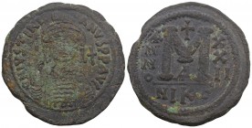 Byzantine
Justinianus I AE Follis, Nikomedia 18.1gr 35.7mm
Obv. D N IVSTINIANVS PP AVC, Diademed, helmeted, and cuirassed facing bust, holding globus ...