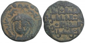 Zengids of Mawsil. Saif ad-Din Ghazi II(?) (565 - 576 H. / 1170 - 1180). 
Dirham (copper). 557 H. Mawsil. 12.3gr 28.3mm
Vs: Male head half-left, above...