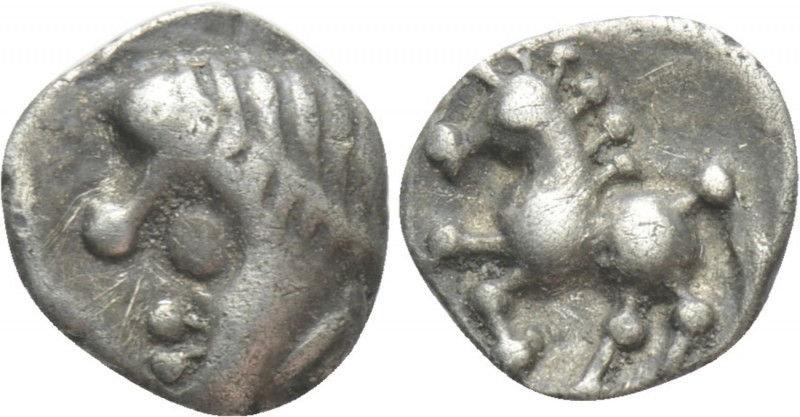CENTRAL EUROPE. Boii. Obol (1st century BC). 

Obv: Head left.
Rev: Horse pra...