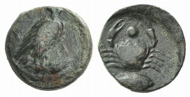 Sicily, Akragas, c. 425-406 BC. Æ Onkia (16mm, 3.96g, 4h). Eagle standing r. with head reverted, on a fish. R/ Crab, fish l. below; pellet between cra...