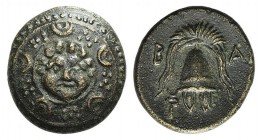 Kings of Macedon. Philip III (323-317 BC). Æ Half Unit (15mm, 3.69g, 11h). Salamis. Macedonian shield, facing gorgoneion on boss. R/ Helmet; kerykeion...