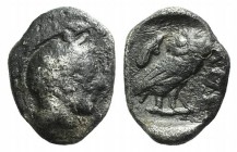 Attica, Athens, c. 454-404 BC. AR Obol (10mm, 0.65g, 12h). Helmeted head of Athena r. R/ Owl standing r., head facing; olive sprig and crescent behind...