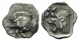 Mysia, Kyzikos, c. 450-400 BC. AR Hemiobol (8mm, 0.37g, 11h). Forepart of boar l.; tunny to r. R/ Head of lion l.; star to l.; all within incuse squar...