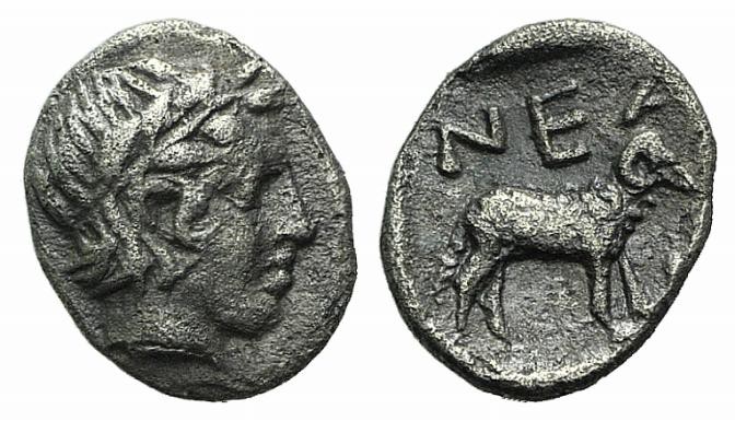 Troas, Neandria, 4th century BC. AR Obol (8mm, 0.54g, 6h). Laureate head of Apol...