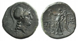 Aeolis, Aigai, 2nd-1st centuries BC. Æ (16mm, 4.08g, 12h). Helmeted head of Athena r. R/ Nike advancing l., holding wreath and palm; monograms to l. a...