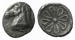 Aeolis, Kyme, c. 6th century BC. AR Hemiobol (5mm, 0.18g). Head of horse l. R/ Stellate floral pattern. Unpublished in the standard references. Rare, ...