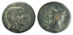 Caria, Keramos, 2nd century BC. Æ (18mm, 7.14g, 12h). Male head (Apollo?) r. R/ Facing bucranium. SNG Kayhan 809; SNG von Aulock 2580. Green patina, n...