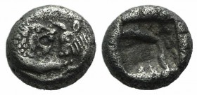 Kings of Lydia, time of Kroisos, c. 550-546 BC. AR 1/12 Siglos (6mm, 0.77g). Sardes. Confronted foreparts of lion r. and bull l. R/ Two incuse square ...
