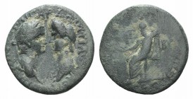Domitian with Domitia (81-96). Phrygia, Cibyra. Æ (23mm, 5.24g, 7h). Confronted busts of Domitian, laureate, and Domitia, draped. R/ Zeus seated l., h...