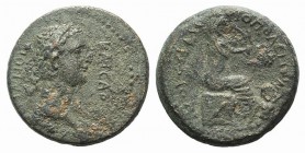 Domitian (81-96). Cilicia, Flaviopolis-Flavias. Æ (23mm, 7.94g, 12h), year 17 (89/90). Laureate head r. R/ Tyche seated r., holding grain ears; at fee...