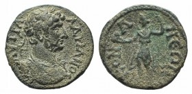 Hadrian (117-138). Pisidia, Conana. Æ (16mm, 2.22g, 12h). Laureate and cuirassed bust r. R/ Mên standing l., holding pine-cone and resting on staff. R...