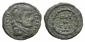 Maxentius (306-312). Æ Quarter-Follis (18mm, 2.23g, 12h). Rome, 307-309/10. Head r., wearing lion's skin headdress. R/ VOT/X/FEL in three lines within...