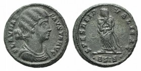 Fausta (Augusta, 324-326). Æ Follis (17mm, 3.52g, 6h). Siscia, 326-7. Draped bust r., wearing pearled necklace. R/ Spes standing facing, head l., crad...