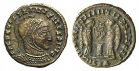Barbaric issue, imitating Constantine I, c. 5th century AD. Æ (17mm, 2.88g, 11h). Laureate, helmeted and cuirassed bust r. R/ Two Victories standing v...