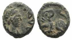 Vandals, Uncertain, 5th century. Æ Nummus (8mm, 1.08g, 6h). Radiate, draped and cuirassed bust r. R/ Lion standing l., head r. BMC Vandals -. VF