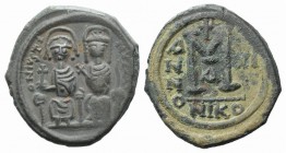 Justin II and Sophia (565-578). Æ 40 Nummi (28mm, 12.24g, 6h). Nicomedia, year 11 (567/8). Crowned and cuirassed bust facing, holding cross on globe a...