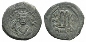 Tiberius II (578-582). Æ 40 Nummi (32mm, 14.82g, 6h). Nicomedia, year 7 (580/1). Crowned facing bust, wearing consular robes, holding mappa and eagle-...
