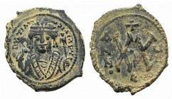 Maurice Tiberius (582-602). Æ 20 Nummi (24mm, 6.32g, 7h). Theoupolis (Antioch), year 7? (588/9). Crowned bust facing, holding mappa and eagle-tipped s...
