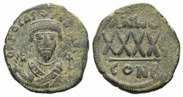 Phocas (602-610). Æ 40 Nummi (28mm,12.13g, 7h). Constantinople, year 8 (609/10). Crowned bust facing, wearing consular robes, holding mappa and crucif...