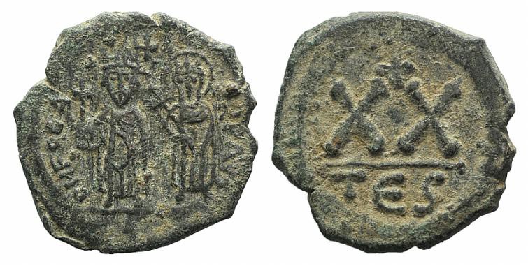 Phocas (602-610). Æ 20 Nummi (20mm, 5.06g, 6h). Thessalonica. Phocas, holding gl...