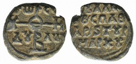 Byzantine Pb Seal, c. 7th-12th century (23mm, 14.62g, 12h). Cruciform monogram. R/ Legend in four lines. VF – Good VF