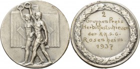 Drittes Reich
 Versilberte Eisenmedaille o.J. (graviert 1937). 2. Gruppenpreis Herbstfestschießen der K.K.S.G. Rosenheim. 2 Athleten nach links schre...